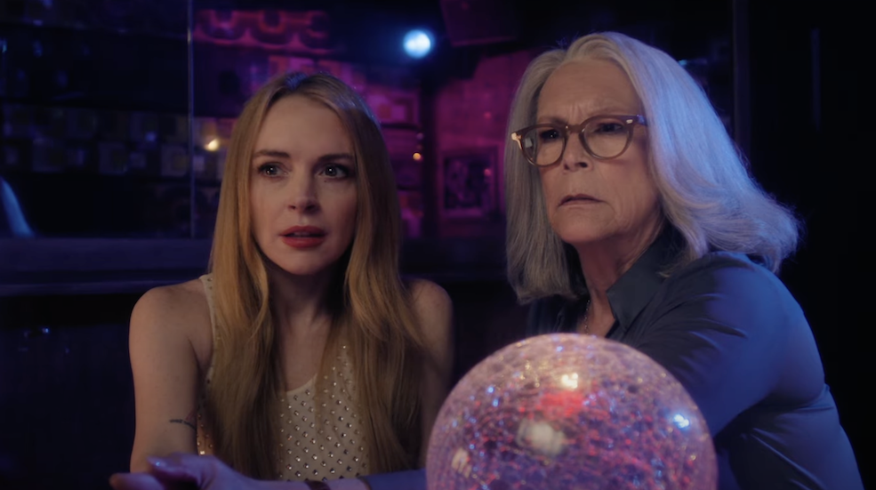 Lindsay Lohan and Jamie Lee Curtis in Freakier Friday being told their fortune